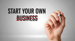 © Taniya - hand crossing out business text on whiteboard with marker