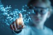 © rinrada - young learner touching virtual molecule diagram, holographic science data, educational technology concept