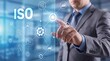 © Bilal - Businessman interacting with ISO quality management system interface with icons