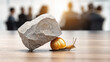 © javu - Stagnation snail carrying heavy stone symbolizing perseverance and slow progress business meeting