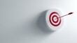 © Chandlerlikes - Archery target with a single arrow in the bullseye, minimalist white background, precision and success