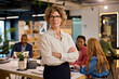 © Rido - Satisied mature business woman looking at camera