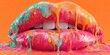 © NovaVision - Vibrant lips covered in dripping colorful paint against a bright orange background