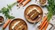 © SimpleLife Stock - Delicious slices of carrot cake with cream cheese frosting and nuts on wooden plates