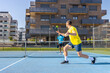 © Ivi - Powerlightss - Pickleball players enjoying a match on a sunny day
