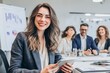 © Gophotograph - Smiling Businesswoman Engaged in Meeting