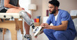 © peopleimages.com - Nurse, amputee and leg with people, consultation and rehabilitation for person with disability. Healthcare, help or appointment for medical prosthetic, physical therapy or man with woman in clinic