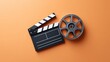 © olga_demina - Clapperboard and film reel on an orange background, representing filmmaking, movie production, entertainment industry, video editing, and content creation concepts