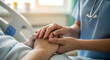© Rohmah - Caring hands of a nurse comforting a patient in a hospital bed with empathy and compassion