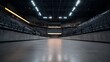 © Bussakon - Low angle view of an empty modern indoor sports arena featuring concrete floors tiered seating and dramatic overhead lighting