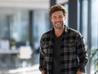 © Johannes - male professional casual friday on a blured office background with natural sunlight