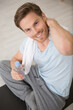 © auremar - young man towelling off after exercising