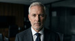 © Shock0991 - Senior business executive in dark office as leadership and authority concept