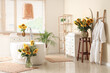 © Pixel-Shot - Interior of bathroom with sunflowers in vases