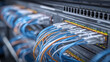 © Anthichada - A close up of a server rack with network cables neatly plugged into high speed ports, representing complex data connectivity and IT infrastructure