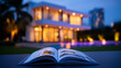 © Curioso.Photography - Open property catalog book in front of modern house at sunset representing real estate marketing and developer offer presentation