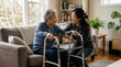 © NanisHappy - Asian elderly woman with walker and caregiver smiling in living room, home support and senior care