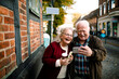 © Davor - Smiling senior couple taking smartphone selfie on historic city street