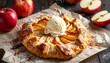 © wikanda - Apple Pie Delight: An inviting homemade apple pie topped with a scoop of creamy ice cream sits among fresh apples, promising a sweet and comforting treat.
