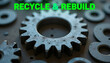 © Hypnotics 14 - Industrial Metal Gears and Cogs with Recycle and Rebuild Text for Sustainability Concept