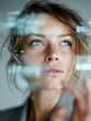 © mstoylik - Woman examining window, Closeup of woman deeply engaged with reflective surface in natural light