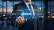 © Air stock - Businessman pointing at digital consulting concept interface on virtual screen in modern office