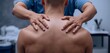 © Nii Armah - young man with his back pain