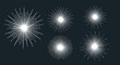 © Md - Set of minimalist white sunburst and starburst vector graphics with radiating lines on a plain dark background for design.