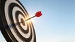 © Jieun - Red arrow hits the bullseye on target board with sun flare symbolizing success goal achievement business strategy precision focus marketing winning concept and accurate planning