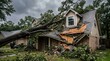 © Tahmina Kazim - Large oak tree fallen on house roof after hurricane or strong storm.