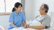 © Willy - Cute, ponytail female caregiver laughing with elderly person sitting up in bed, smiling, generative AI