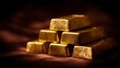 © MohamadIzzudin - Gold Bar Stacks Glimmering in Soft Light on Dark Velvet Background