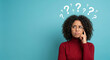 © riddler - Woman with question marks thinking face.