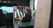 © peopleimages.com - Dance, headphones or black man in caravan with laptop, audio app or listening to music in remote work. Happy, trailer or freelancer with tech, feeling beat or radio subscription in online report.