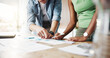 © peopleimages.com - Business people, hands or discussion with documents in office for schedule planning, tasks or ideas. Businessman, woman or employees pointing with paperwork for performance or review in workplace