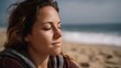 © Thares2020 - Peaceful woman with eyes closed feeling sunlight on a serene beach