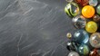 © ShaZett - Collection of Polished Glass Marbles Various Sizes on Stone