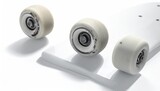 White skateboard wheels with bearings on white surface close-up studio shot for skateboarding equipment and accessories creative product shot