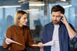 © Liubomir - Angry female boss criticizing male employee for bad performance