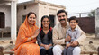 © Niks Ads - Happy Indian Family Portrait Sitting on Charpoy Outdoors