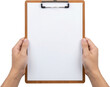 © People Stock - A person's hands hold a wooden clipboard with blank white paper ready for notes or signatures holding empty copy space writing message form document information contract office