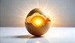 © Natpipat - Cracked Egg with Sun Inside on White Background