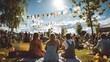 © Oleh - Friends sitting on a blanket on green grass, enjoying an outdoor summer festival with colorful bunting hanging overhead and a large crowd in the background under bright sunny sky