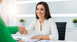 © Morjina  - Successful Job Interview Conclusion with a Handshake Between Applicant and Hiring Manager