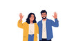 © CreativeGrid - Happy young couple standing together and waving their hands in a friendly greeting against a white background.