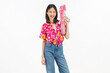 © sitthiphong - Songkran festival in Thailand, Cheerful young woman wearing summer wearing floral shirt with a pink water gun isolated on white background