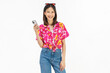 © sitthiphong - Portrait of young Asian woman in summer wearing floral shirt holding smartphone and smiling on white background.