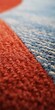 © Andrii Zastrozhnov - Macro textured carpet edge with red border and blue weave closeup fiber detail abstract pattern