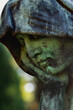 © zwiebackesser - Sad angel statue resting head on hand, symbolizing deep sorrow, contemplation, and emotional vulnerability in a quiet and intimate composition.