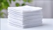 © YChin - Stack of sterile individually wrapped gauze pads for medical use